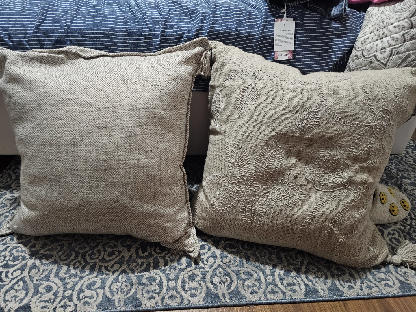 Pair of beige textured accent pillows