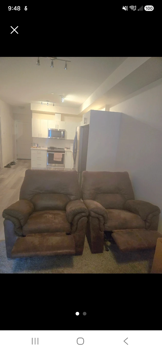 Two Brown Rocking Recliner Armchairs. - photo 2