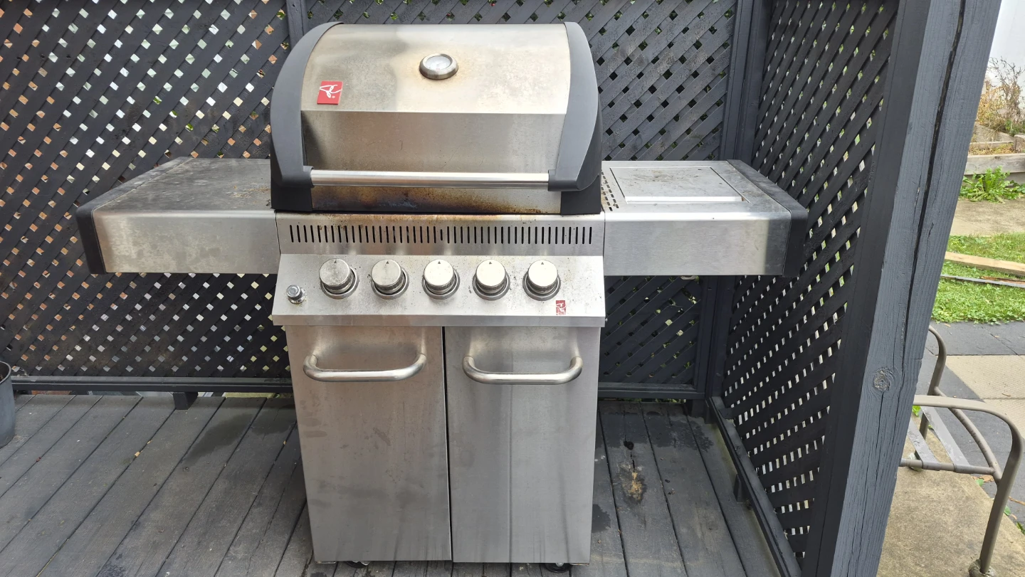 PC BBQ with cover, well used but still works.