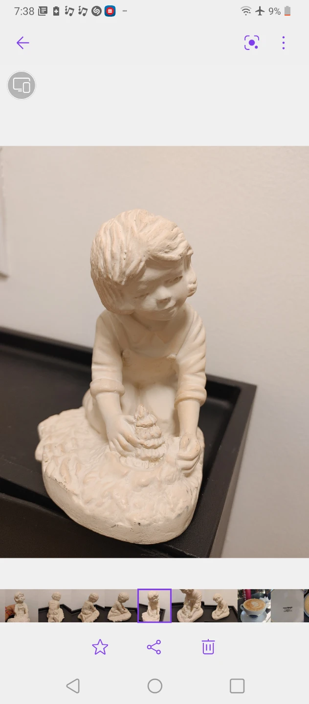 Ceramic child figurine statue