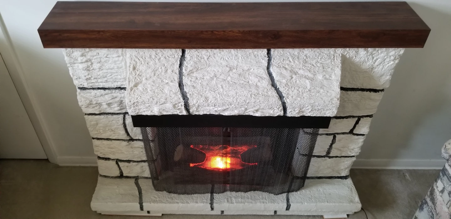 Electric Fireplace with Faux Stone Surround