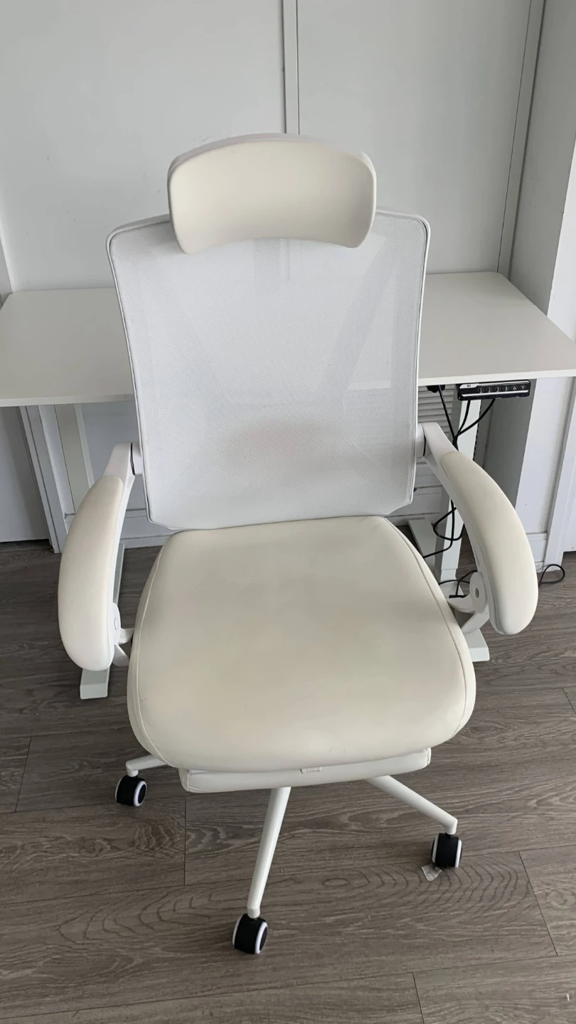 White ergonomic office chair with headrest