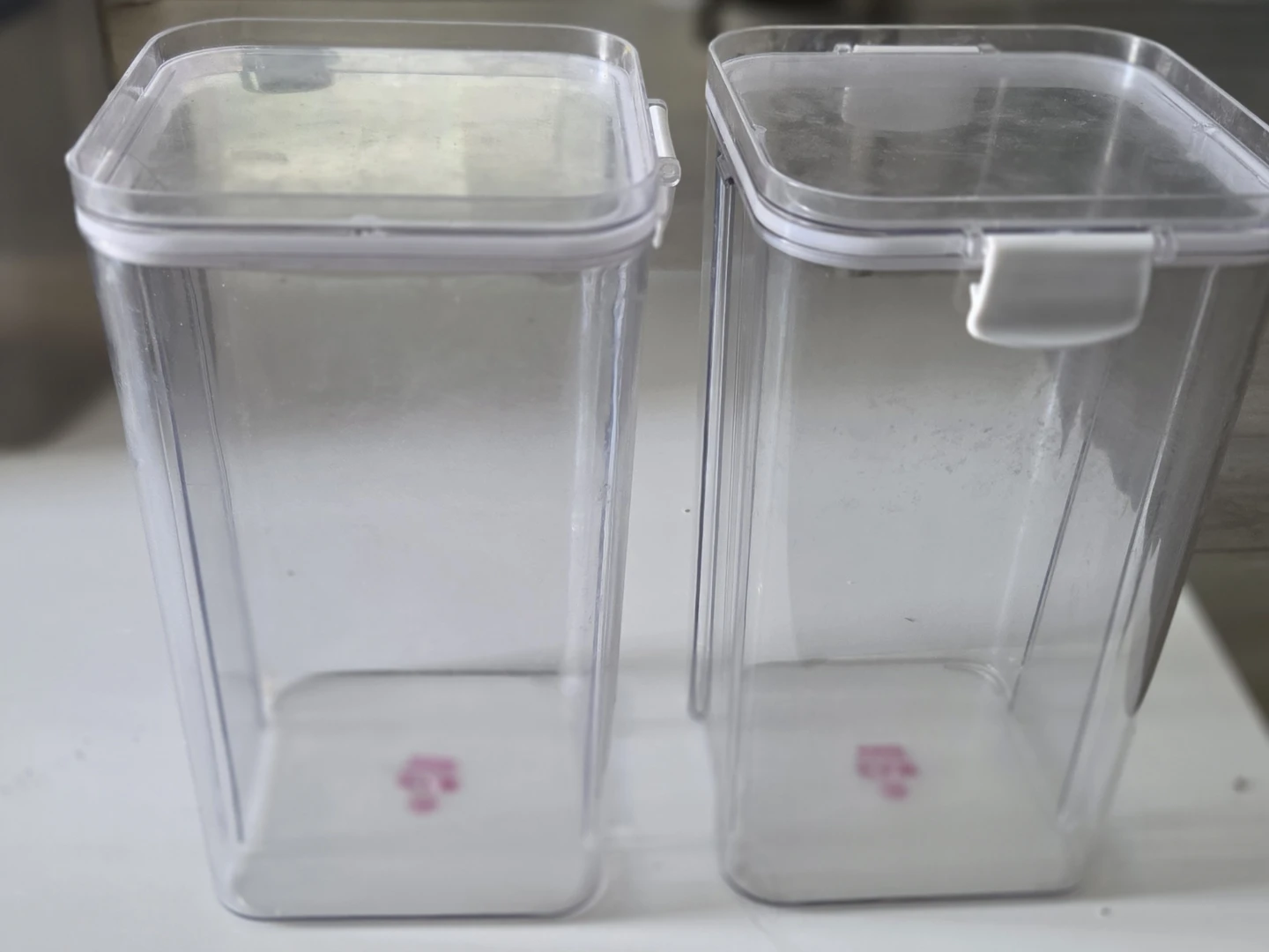 Two Clear Plastic Storage Containers