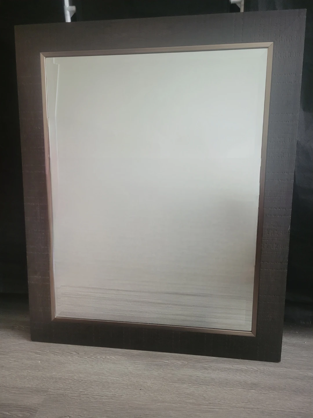 Large dark brown wall mirror