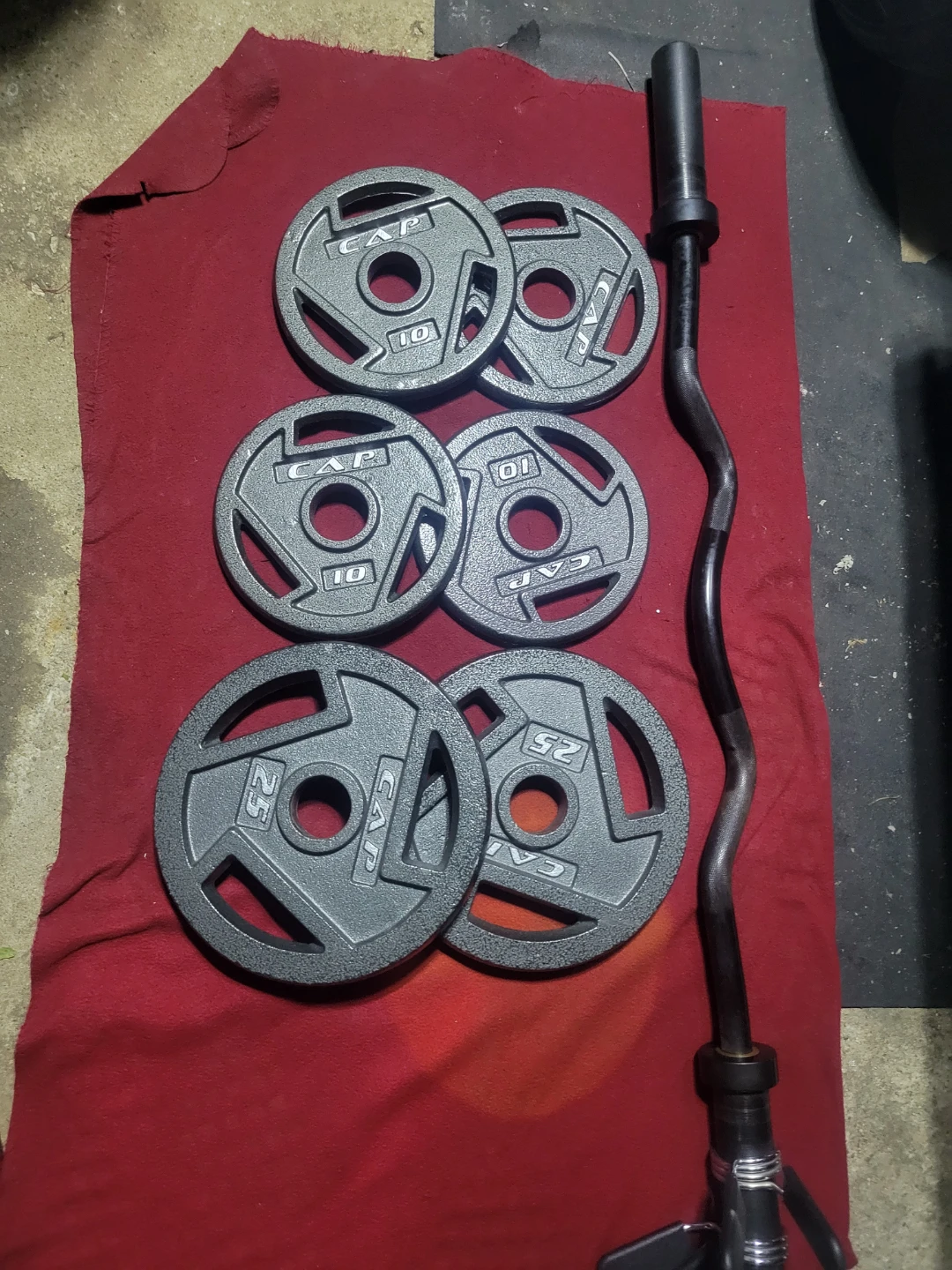 2" HOLE EZ-CURL BAR WITH 90LBSs OLYMPIC PLATES  2-25s  4-10s