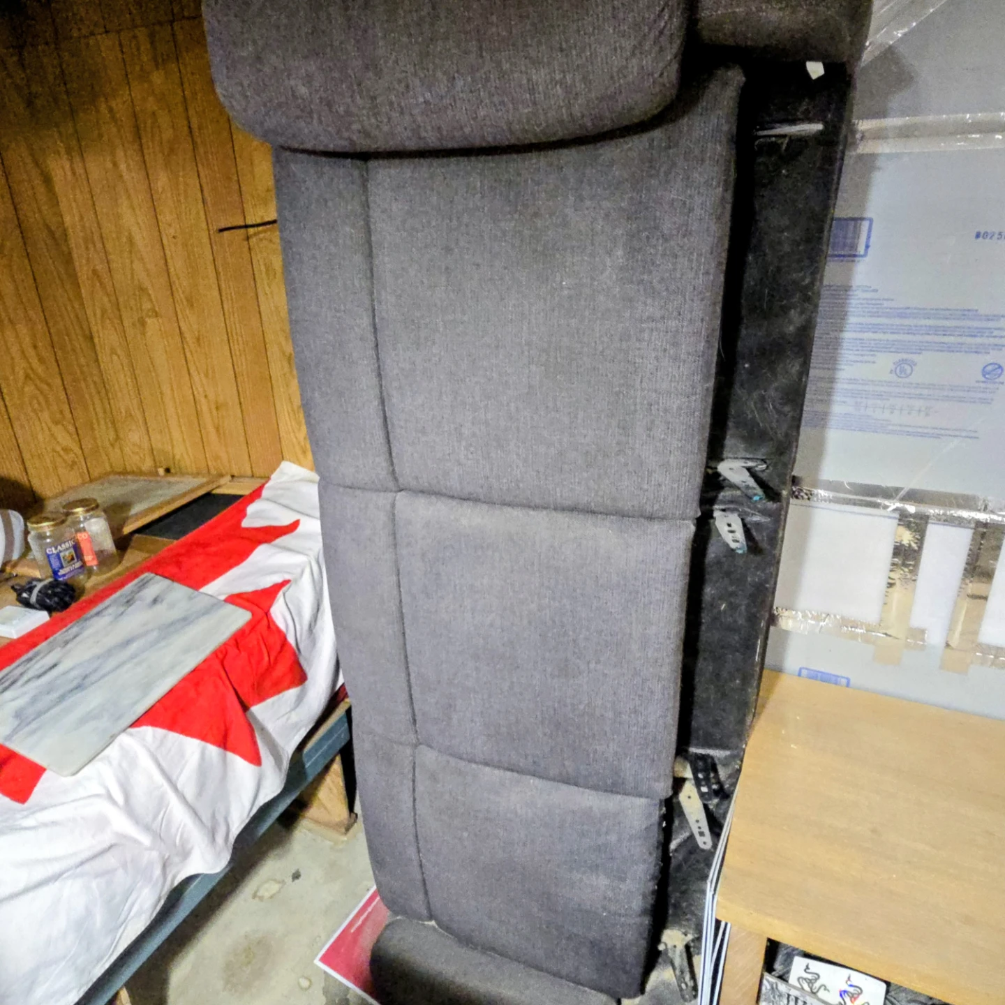 Dark grey recliner chair backrest