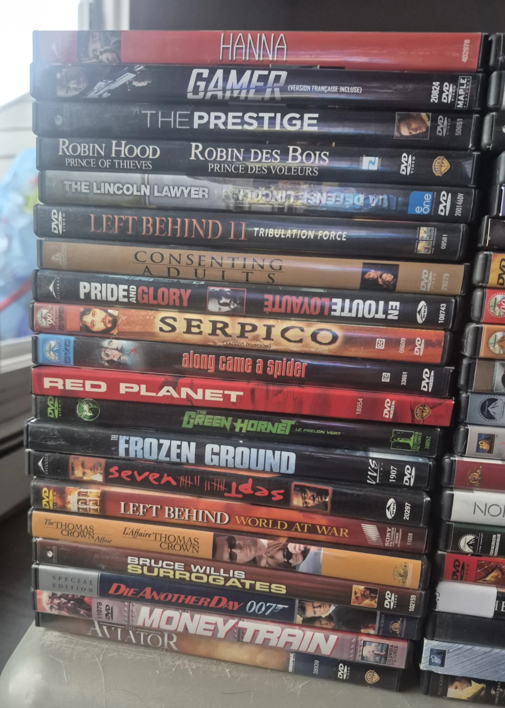 Large collection of 85 action and thriller DVDs - photo 3