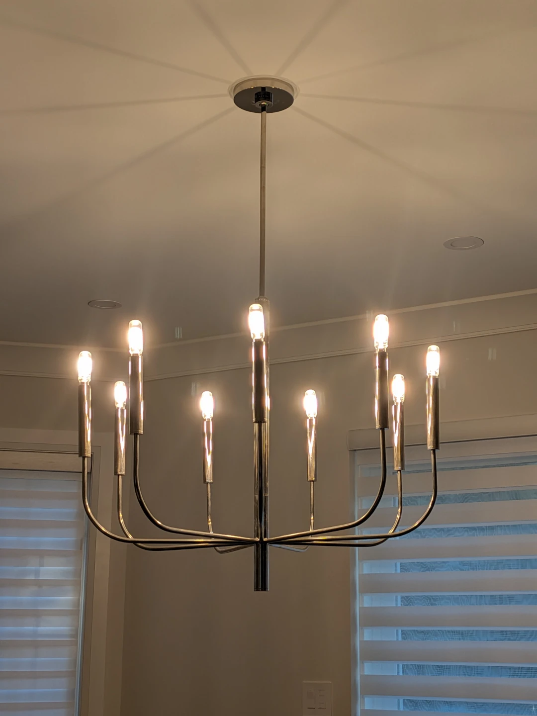 LIKE NEW: 9-light polished nickel chandelier