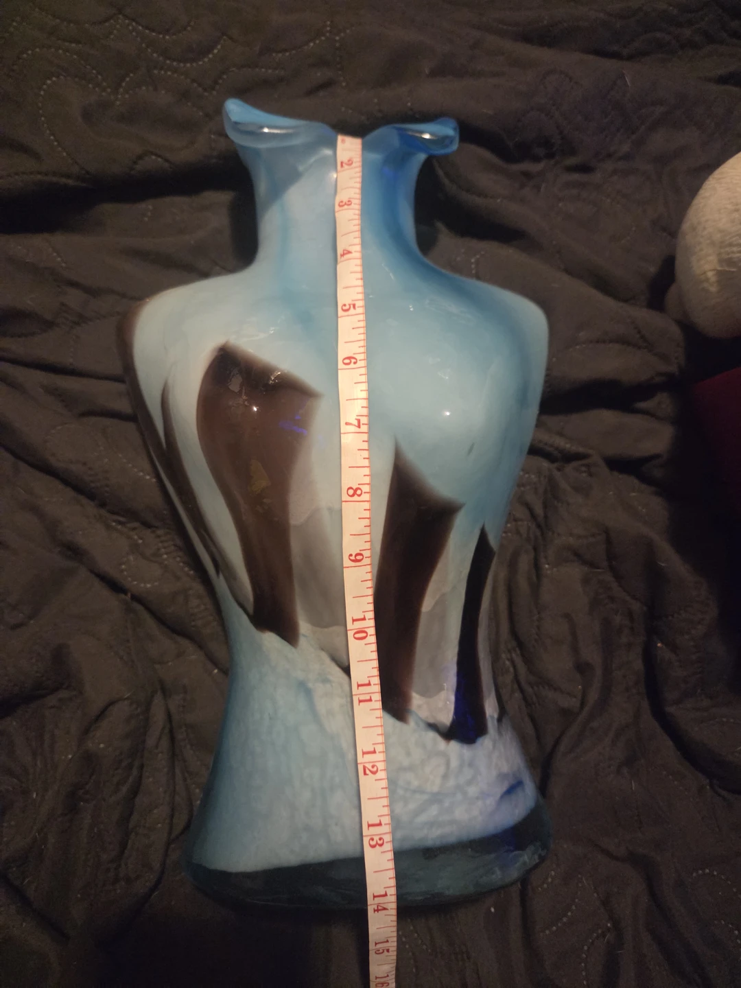Blue and brown hand blown glass vase of woman's torso