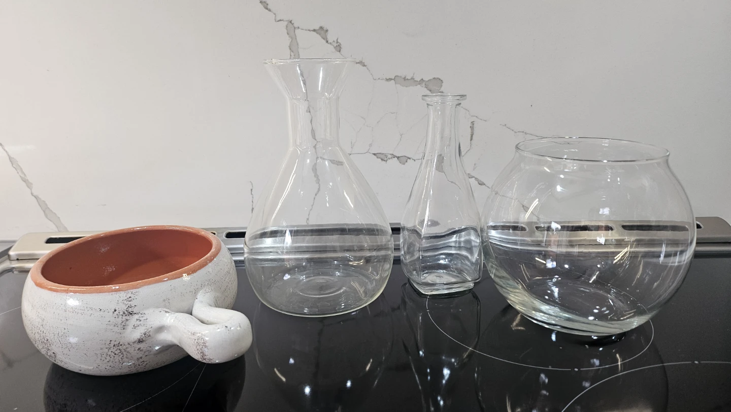 Assorted Glass Vases and a terra Cotta bowl