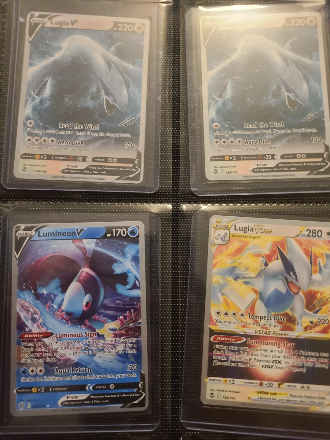 Assorted Pokemon V and VSTAR trading cards
