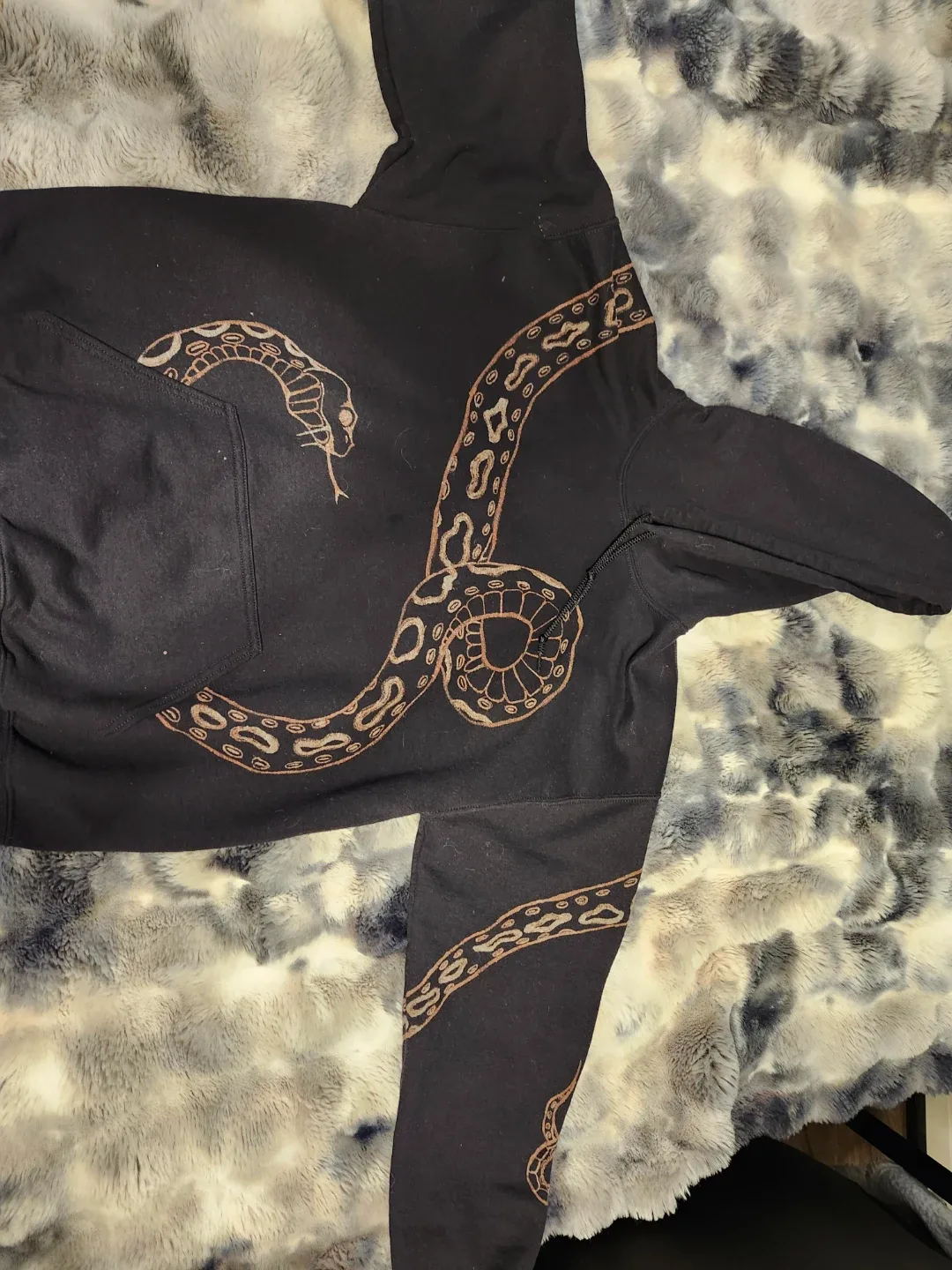 Black hoodie with snake graphic design