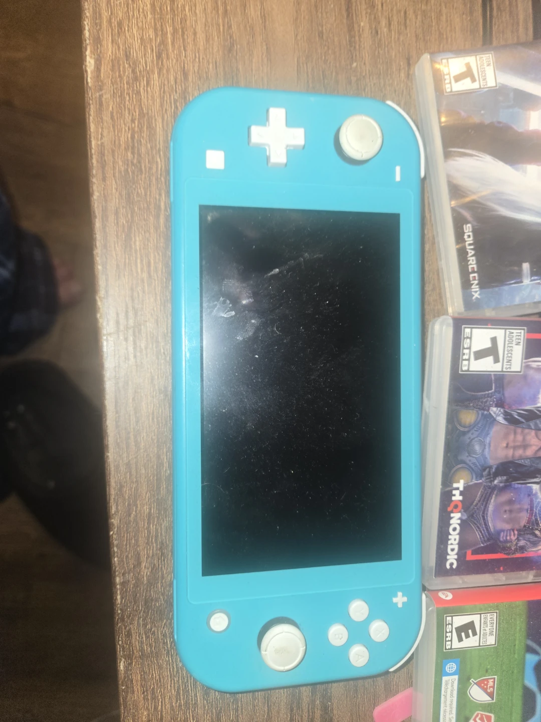 Nintendo Switch Lite Turquoise with 3 Games - photo 2