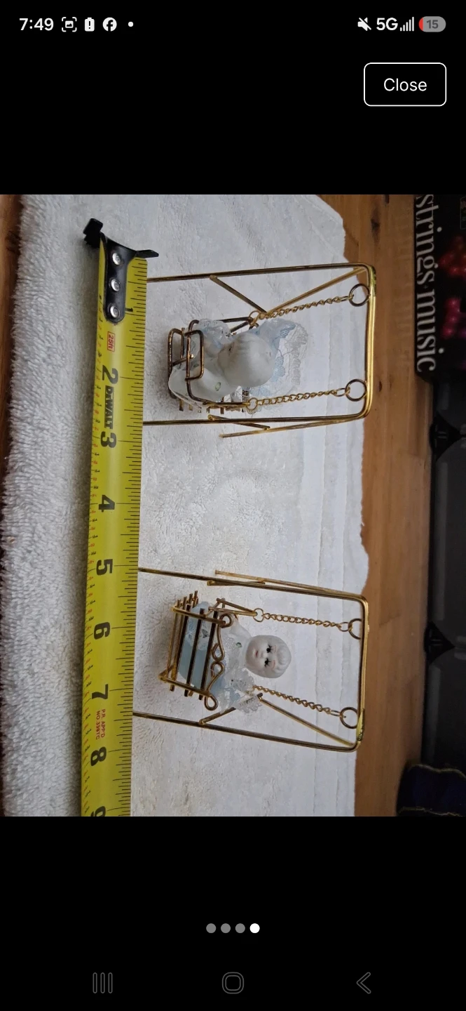 Pair of porcelain baby figurines on gold tone swings - photo 3