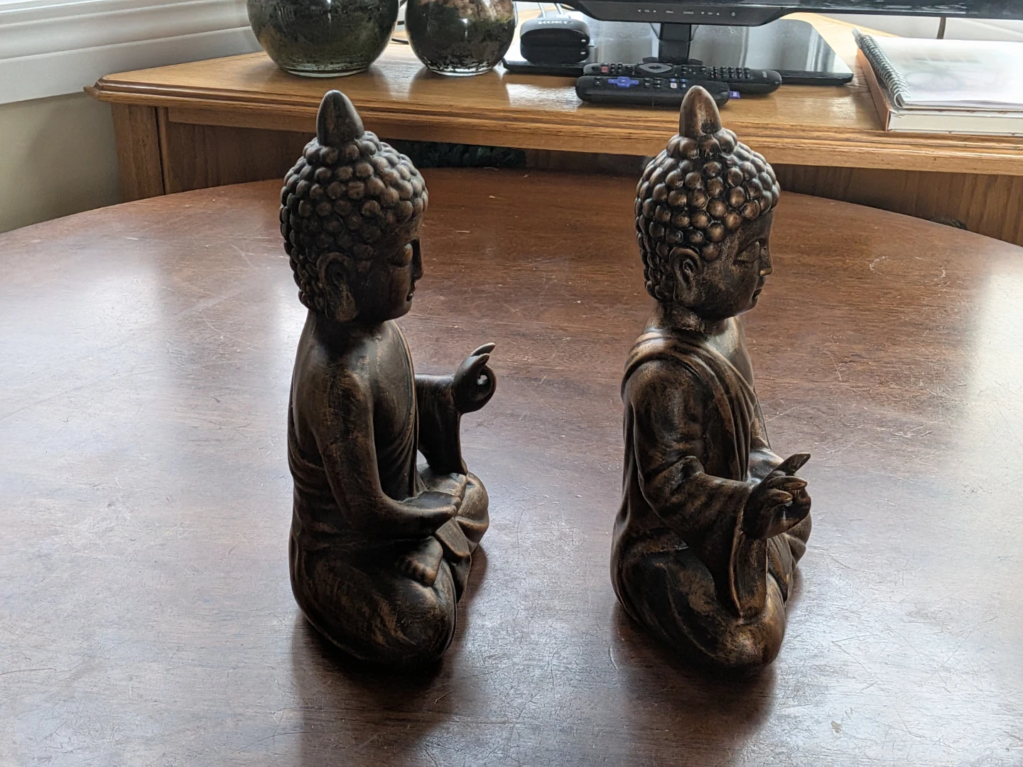 Two Bronze-Finish Buddha Statues