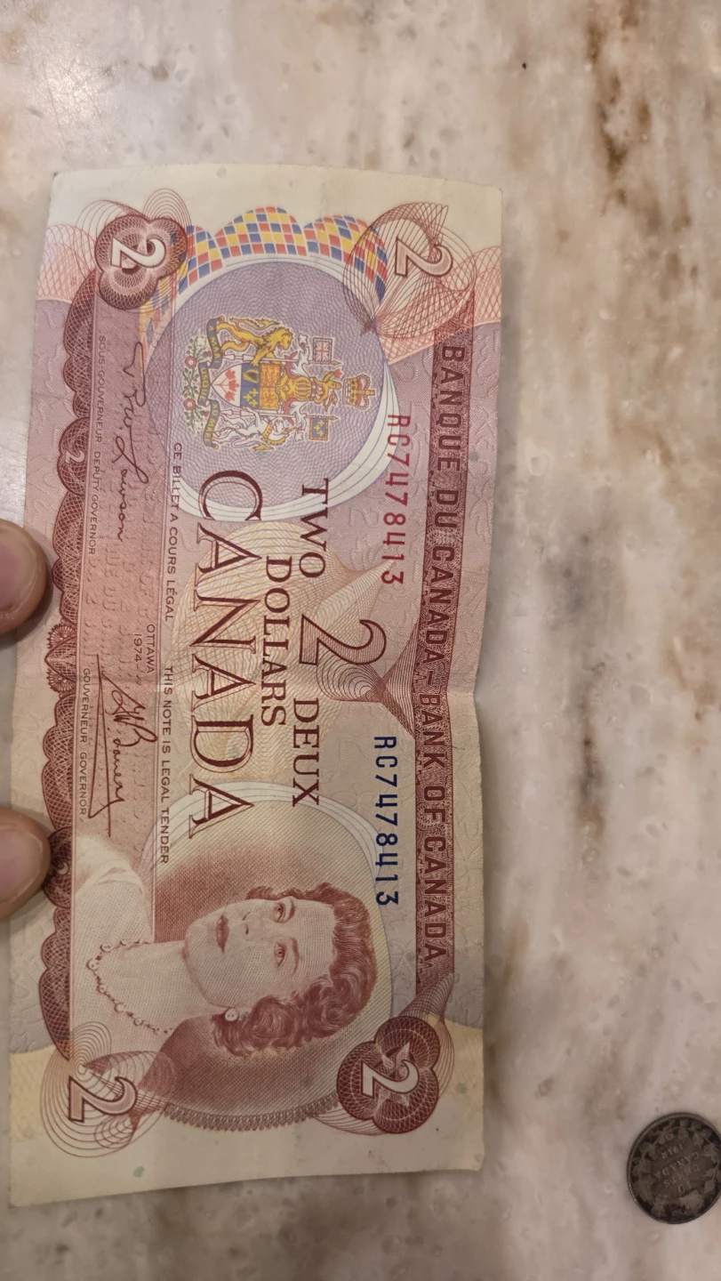 Collection of vintage Canadian coins and 2 dollar bill