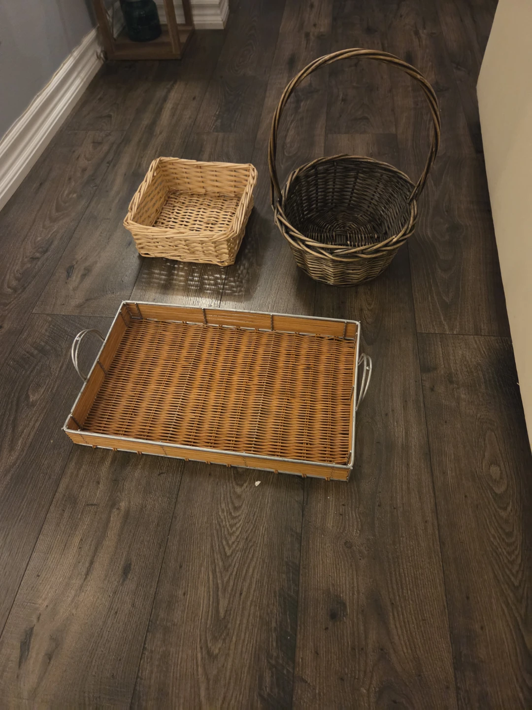 Set of three assorted wicker baskets