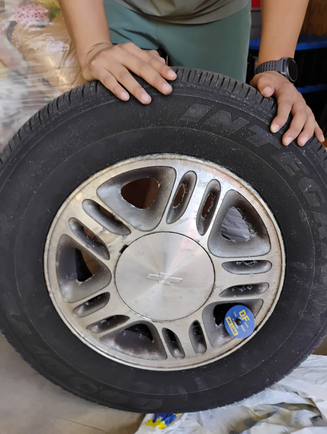 Goodyear Integrity Tire 215/70R15 with Chevy Rim