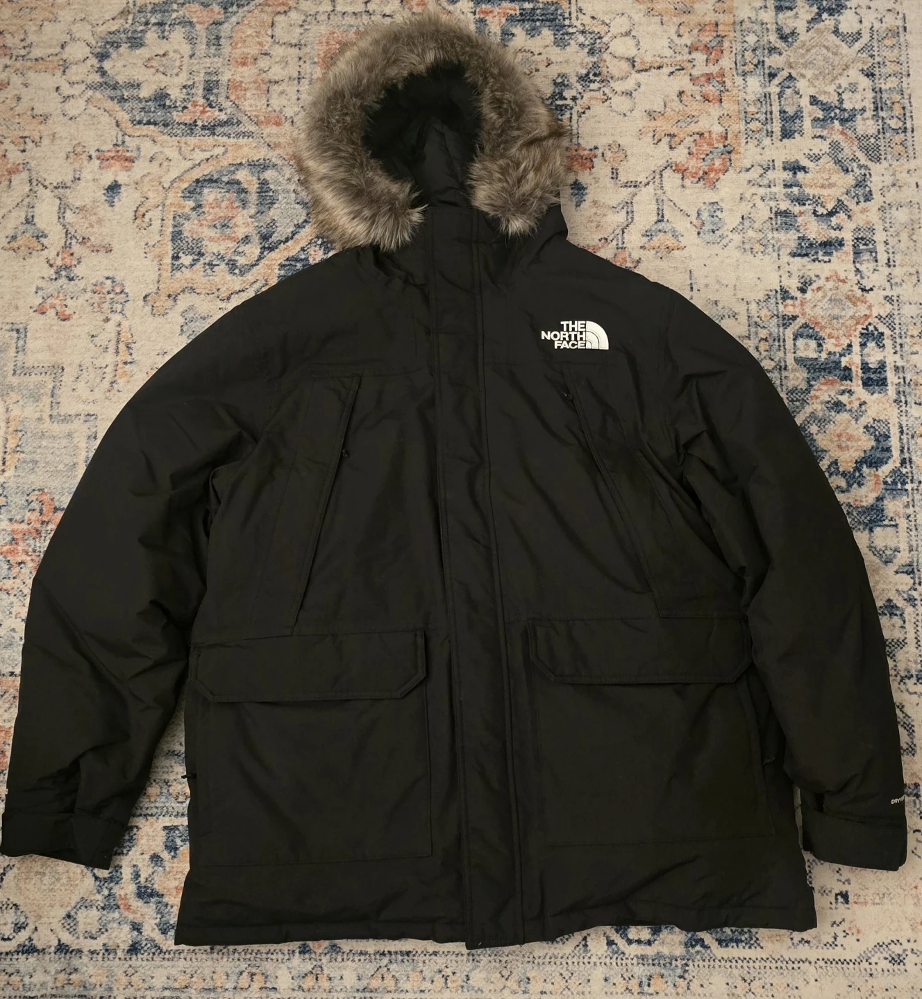 The North Face jacket, size XL, unused.