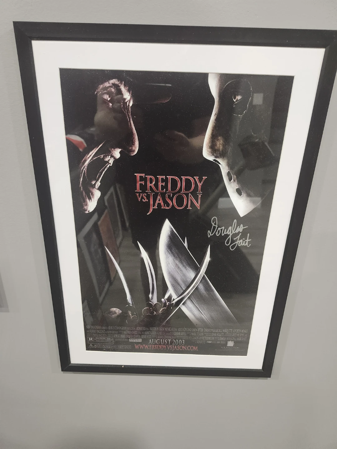 Framed Autographed Freddy vs. Jason Movie Poster