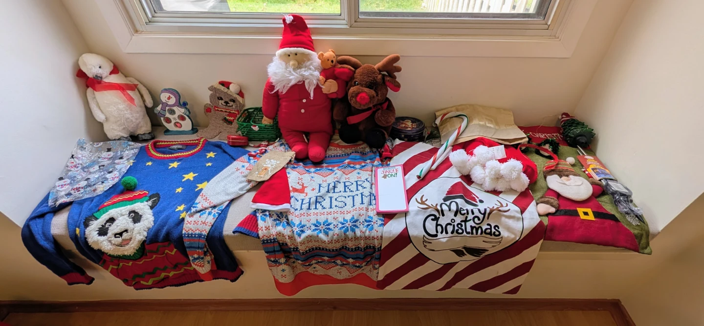 Assorted Christmas Decor and Holiday Sweaters