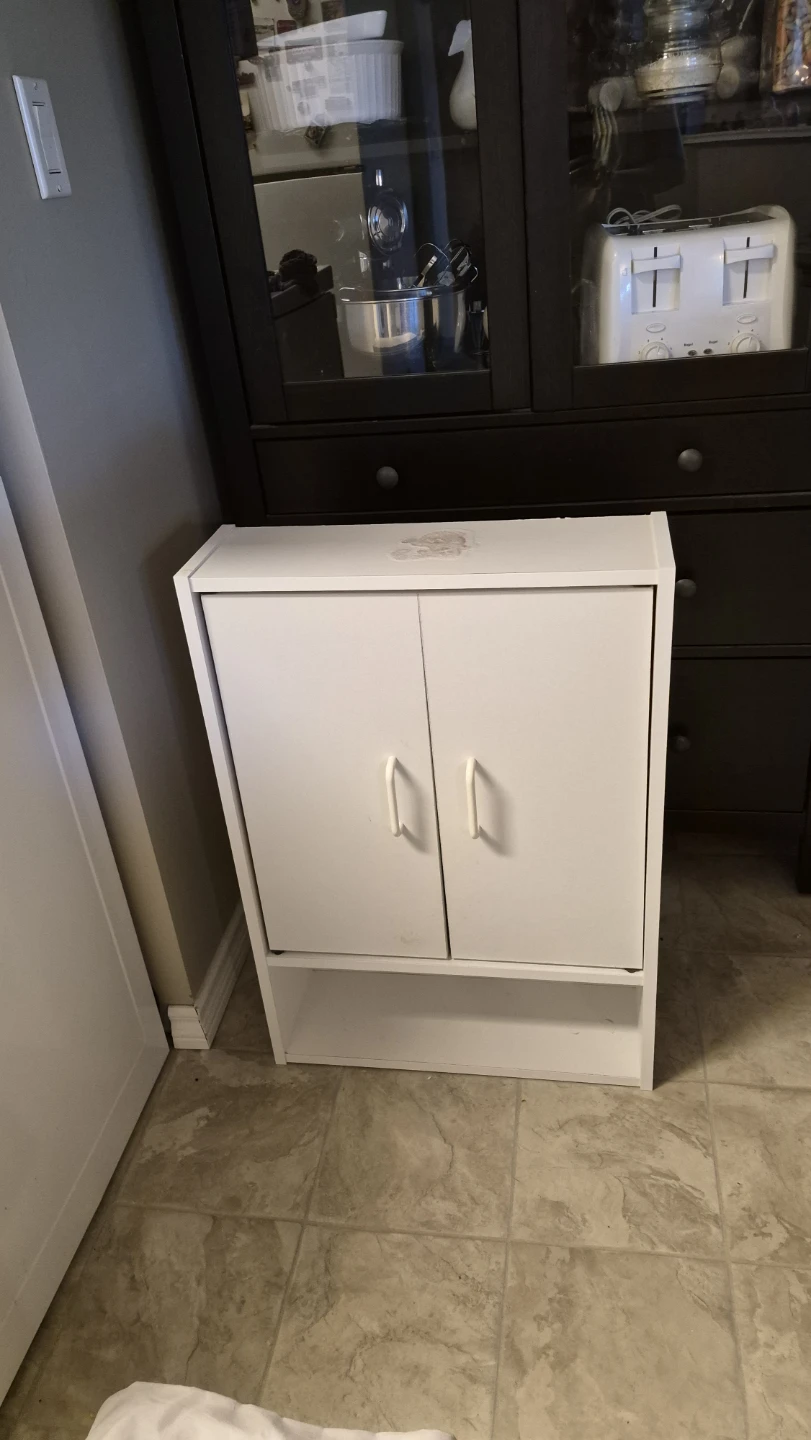 White wall-mounted storage cabinet