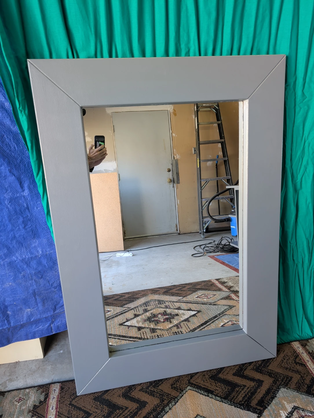 Large grey framed wall mirror
