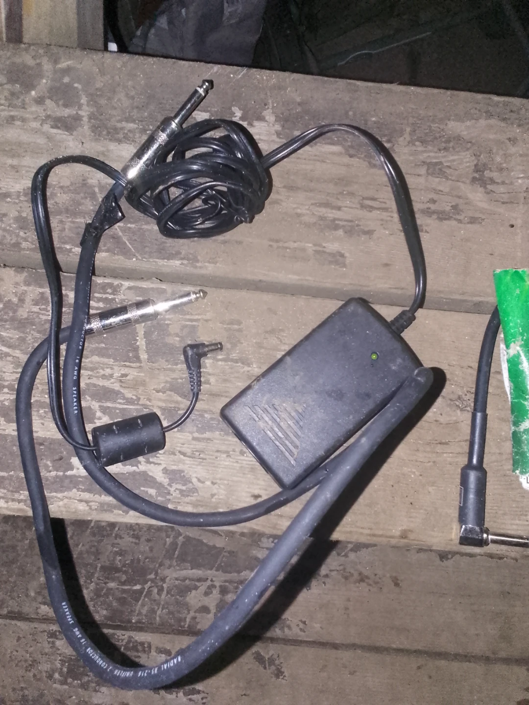 Assorted Guitar Strings and Instrument Cables