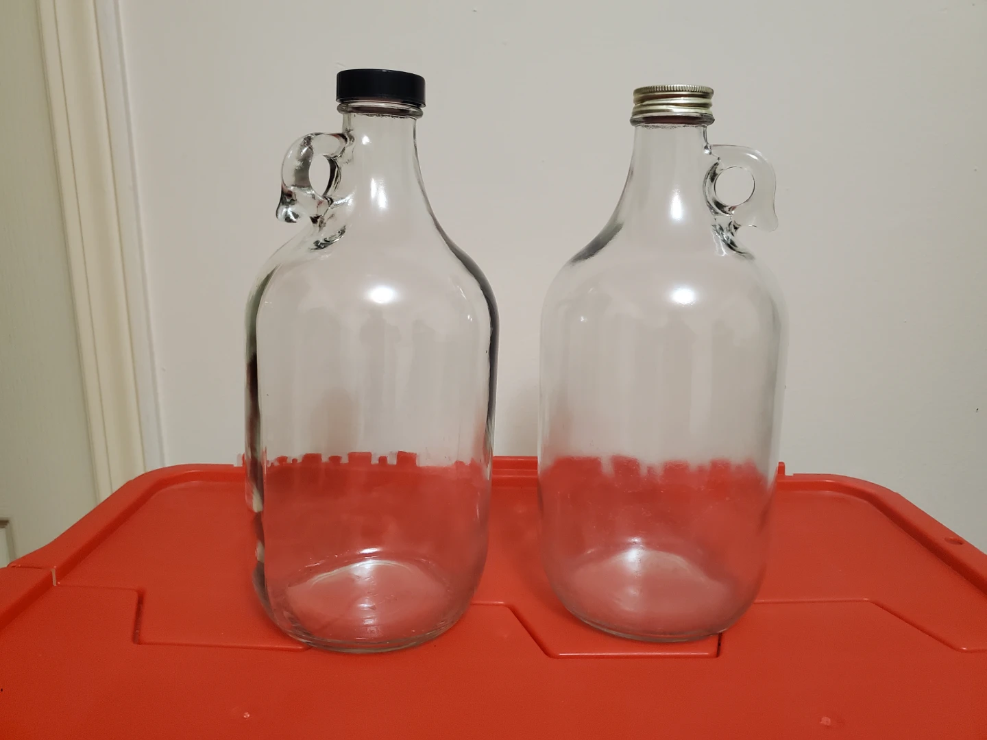 Two 64oz Glass Growlers