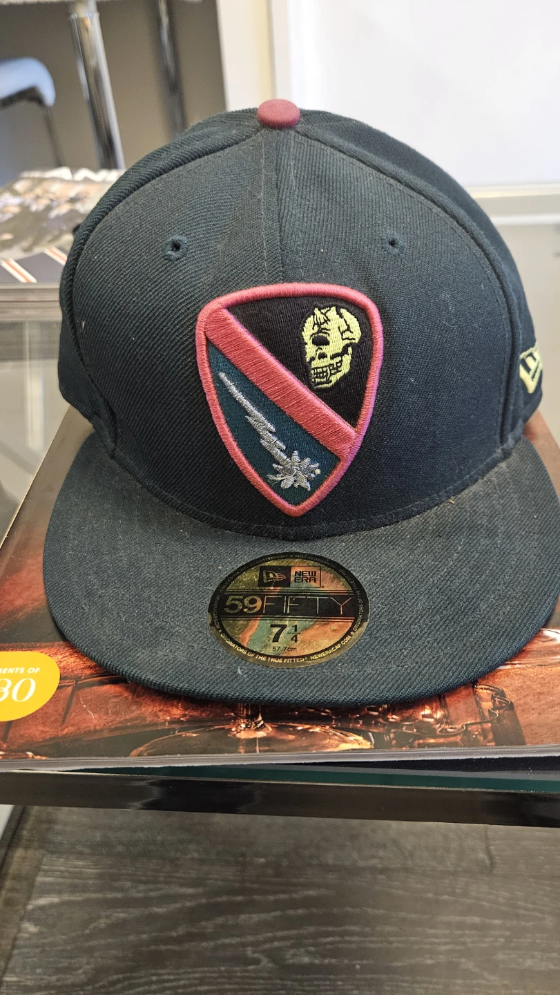Green Mishka New Era hat size 7 1/4.