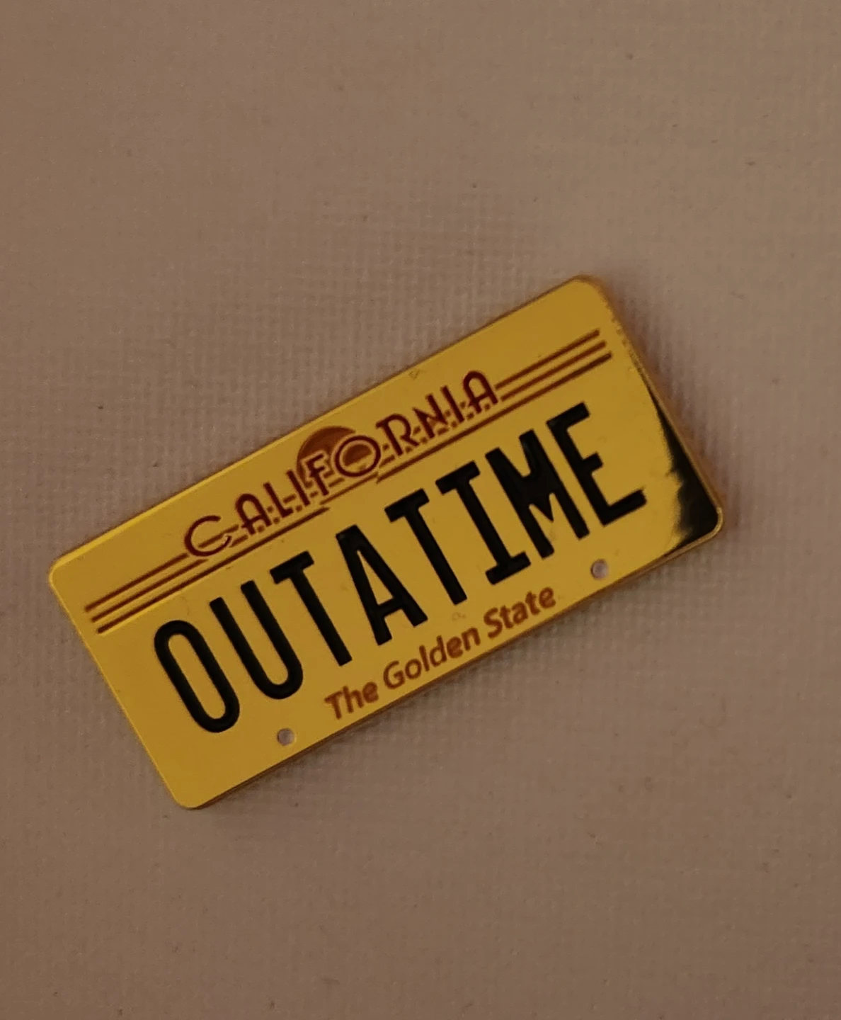 OUTATIME License Plate Enamel Pin