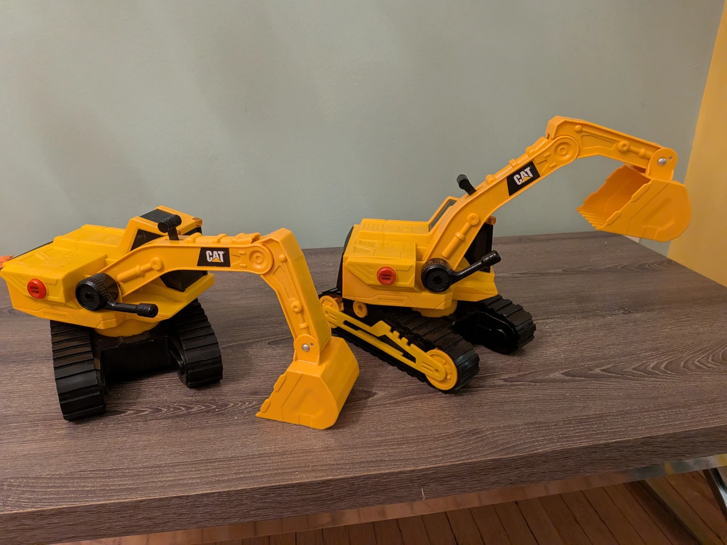 Two CAT Excavator Toy Construction Vehicles