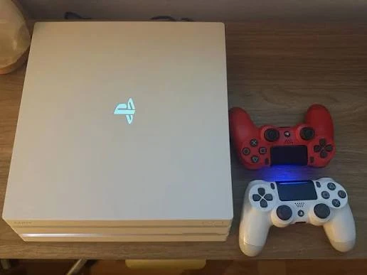 Sony PlayStation 4 Pro Glacier White Console with 2 Controllers