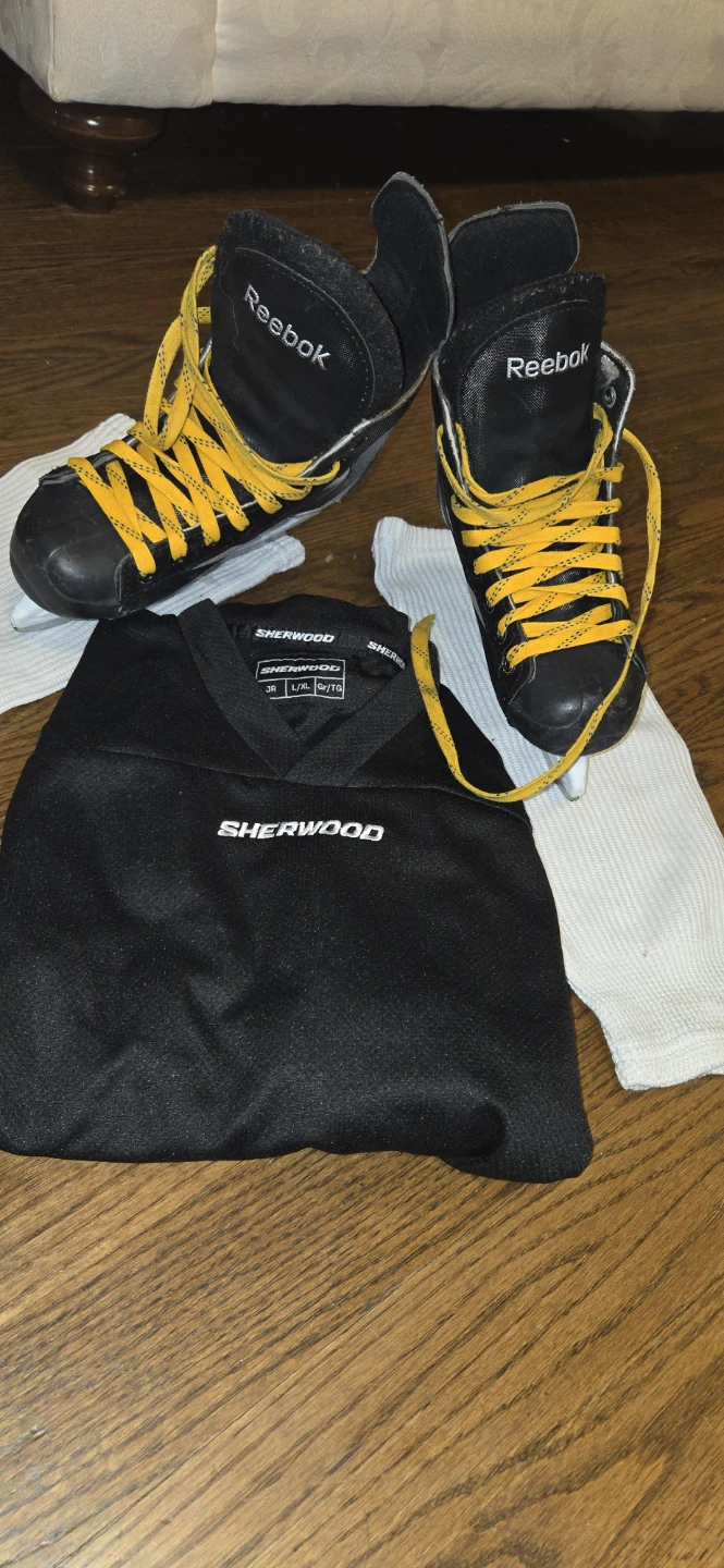 Kids size 2 ( shoe 3½)Reebok Skates and Sherwood Jersey Set