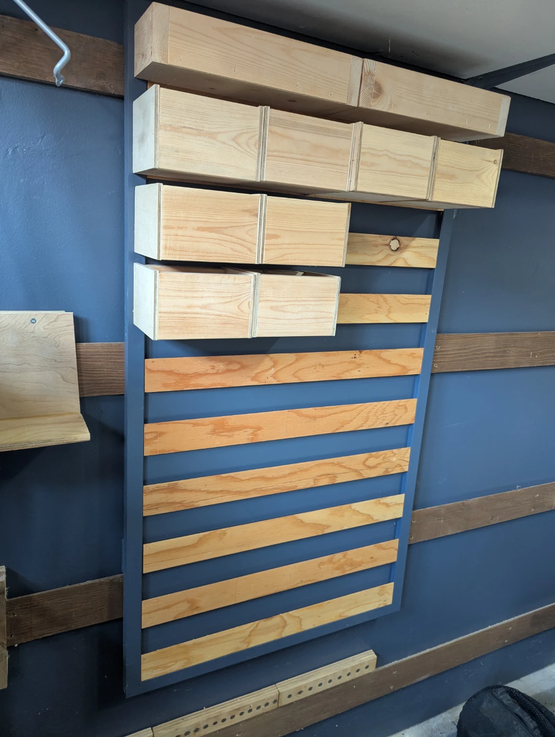 Homemade French cleat workshop small part storage board