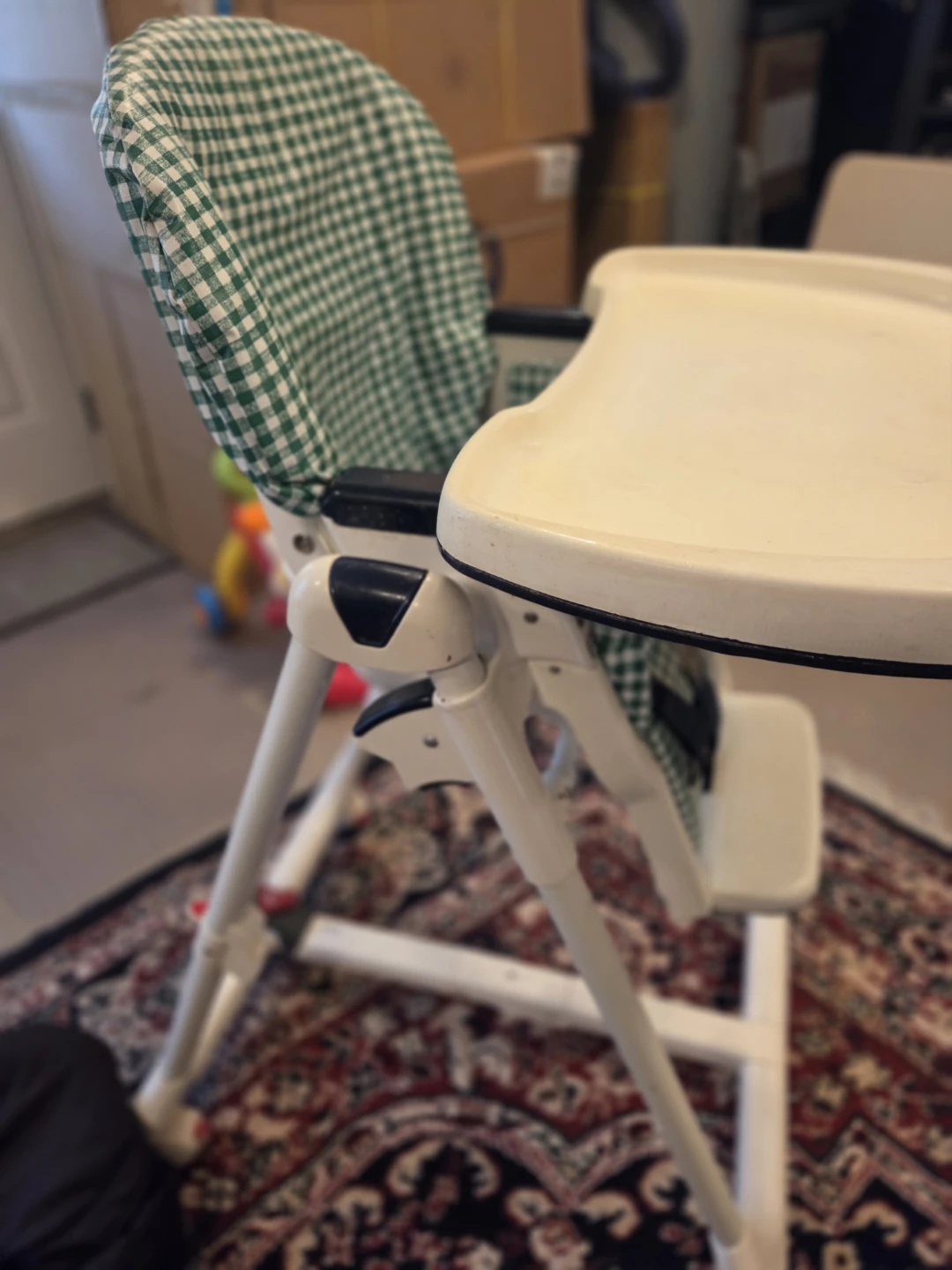 Peg Perego high chair with green checkered seat - photo 3