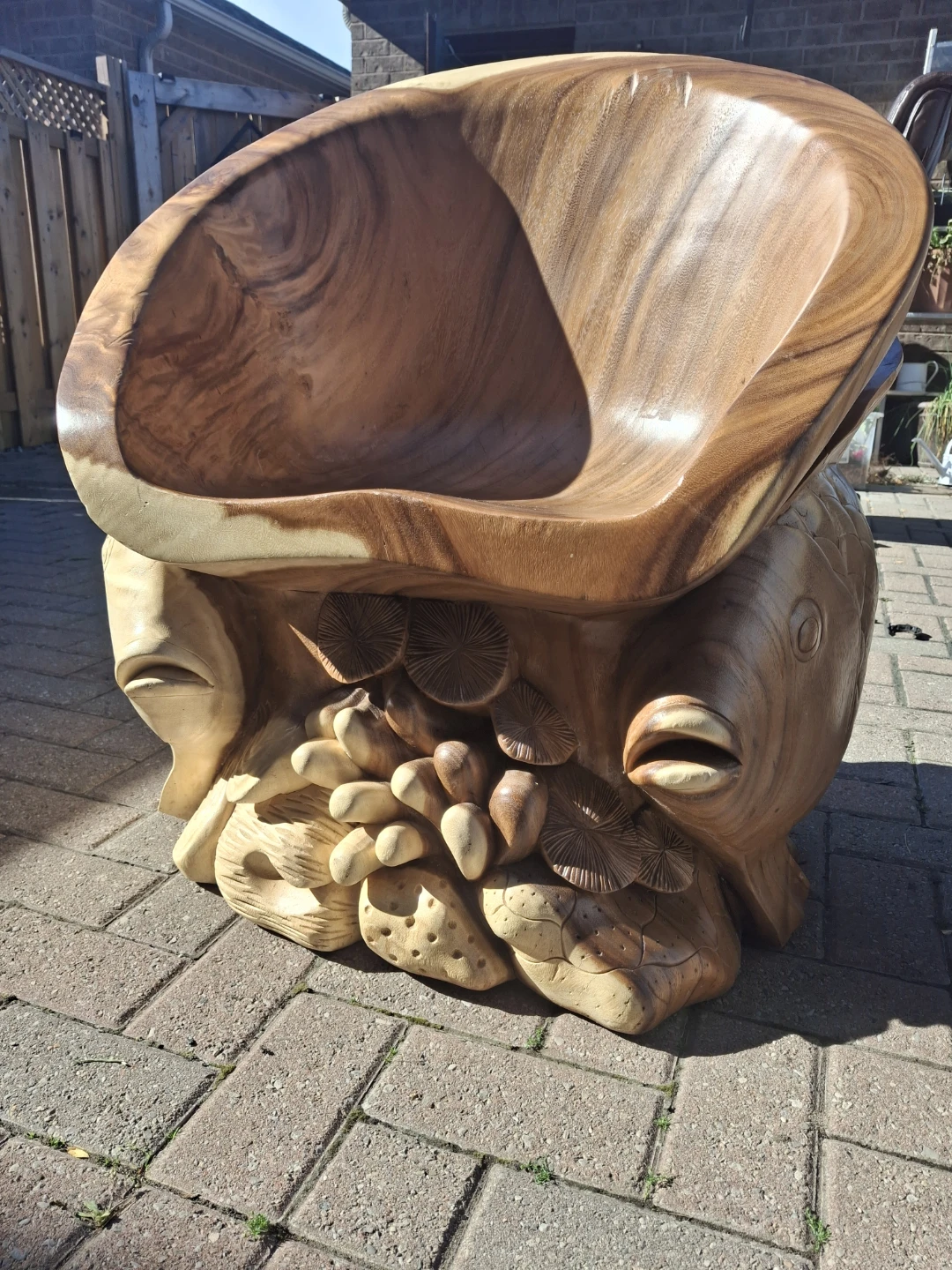 Hand-carved wooden fish accent chair