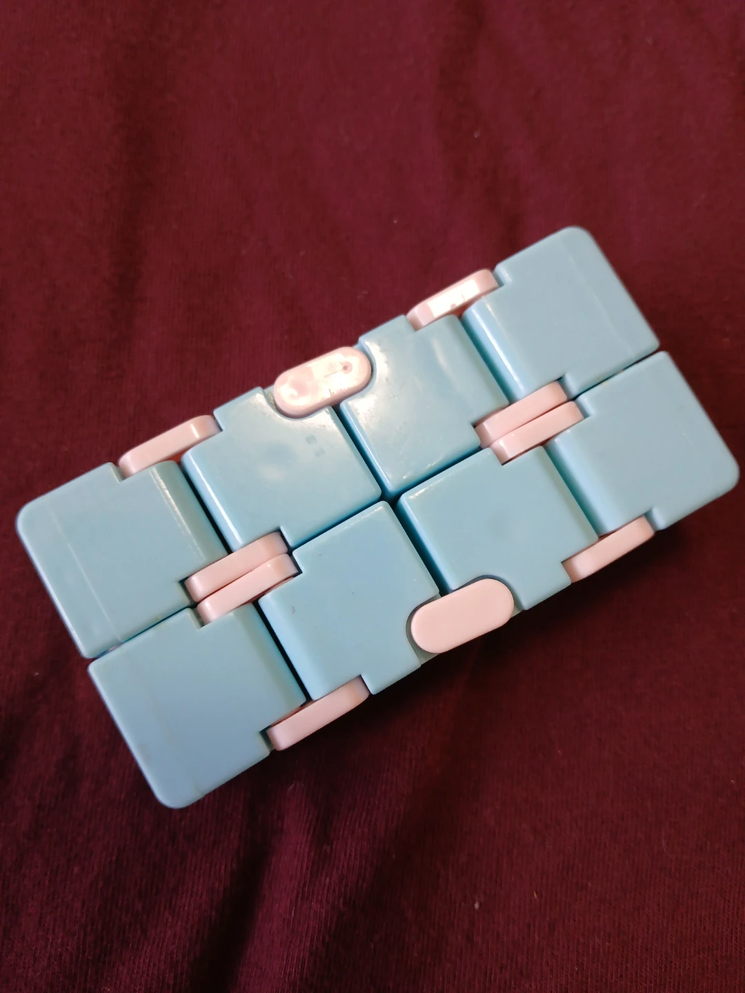 Blue and pink infinity cube fidget toy