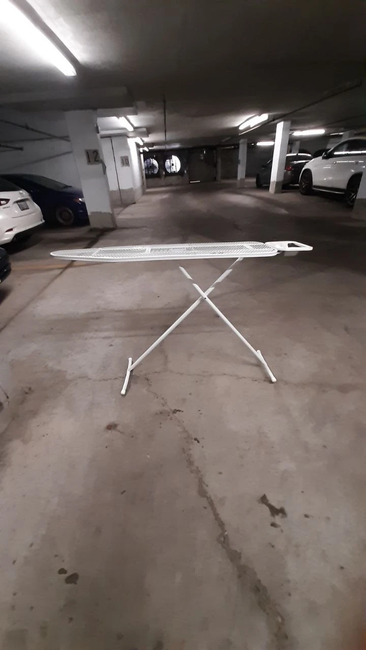 White Metal Ironing Board With New Cover