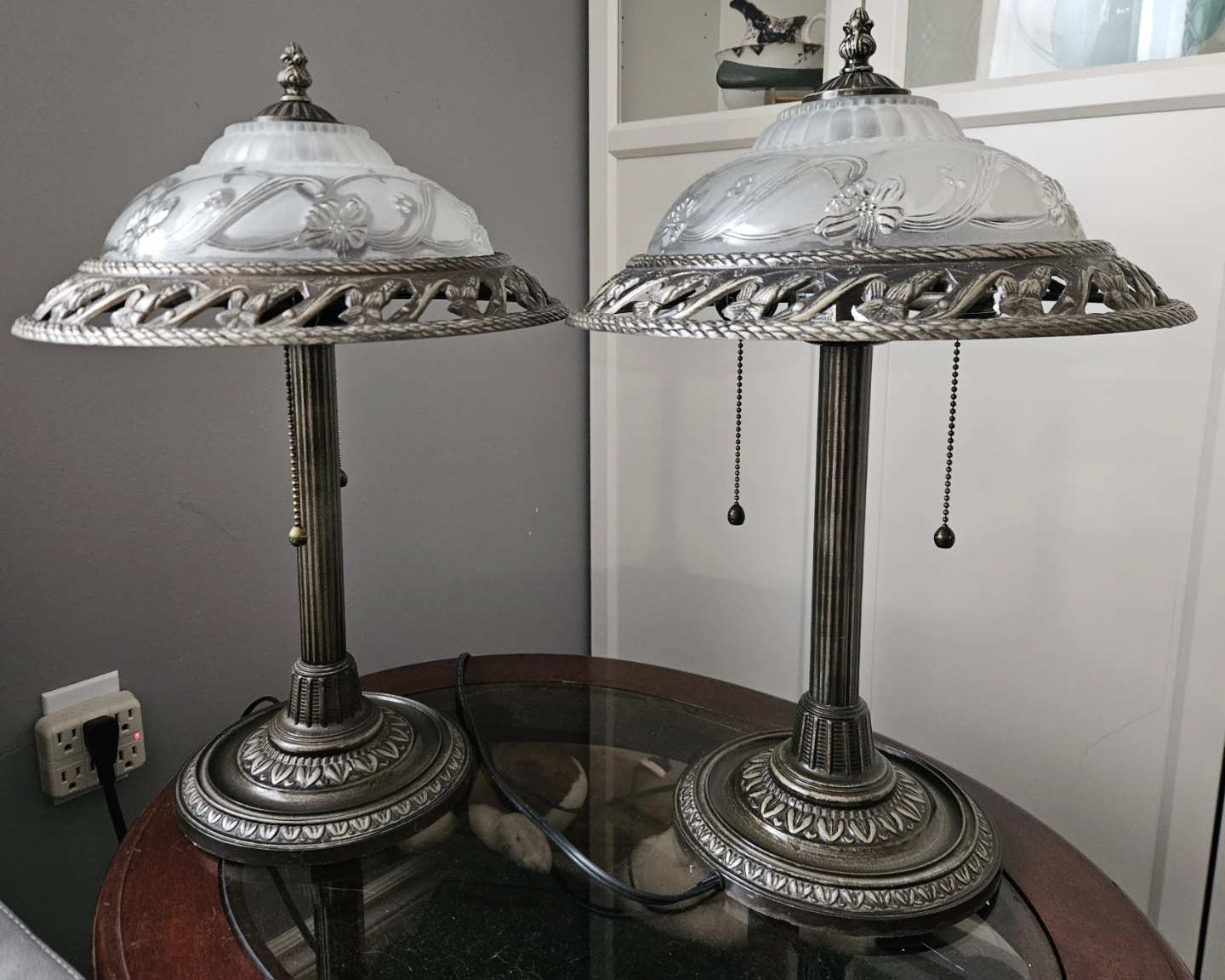 Ornate metal/glass lamps.