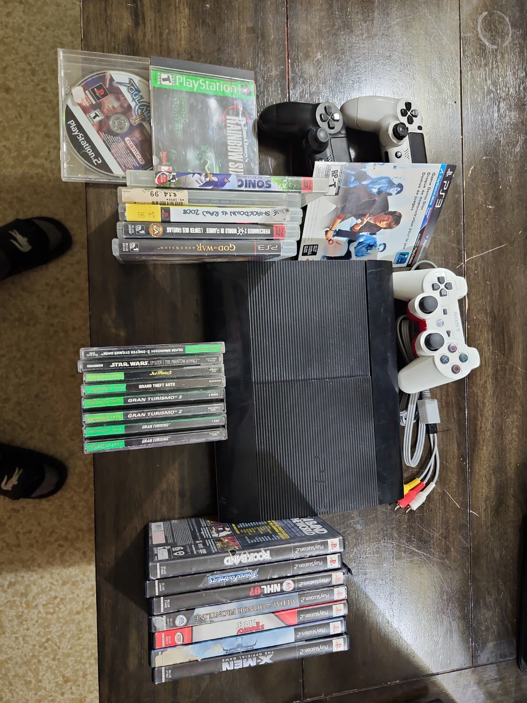 PlayStation 3 Console with 2 Controllers and 19 Games