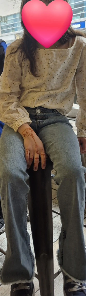 Light wash jeans with distressed details