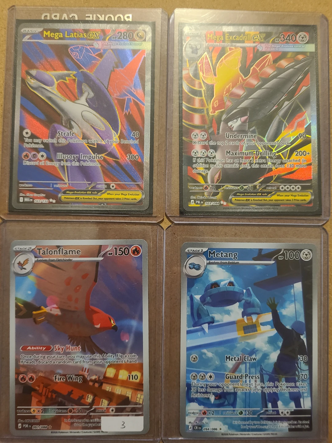 Four Pokemon Trading Cards