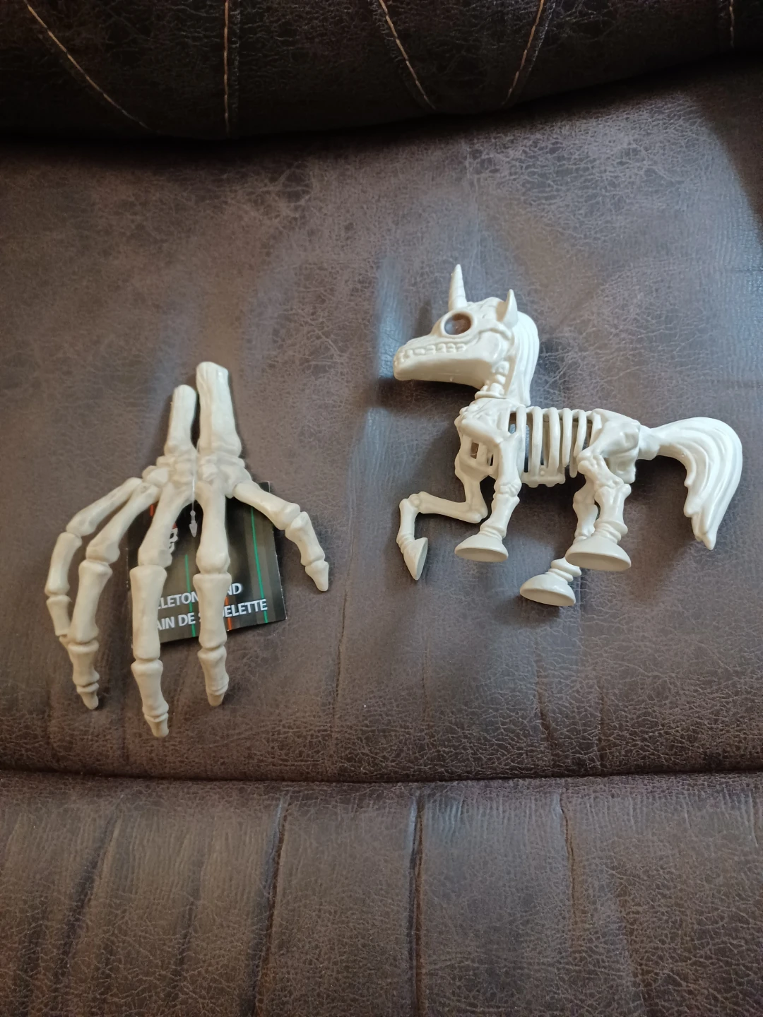 Halloween Skeleton Hand and Unicorn Figures