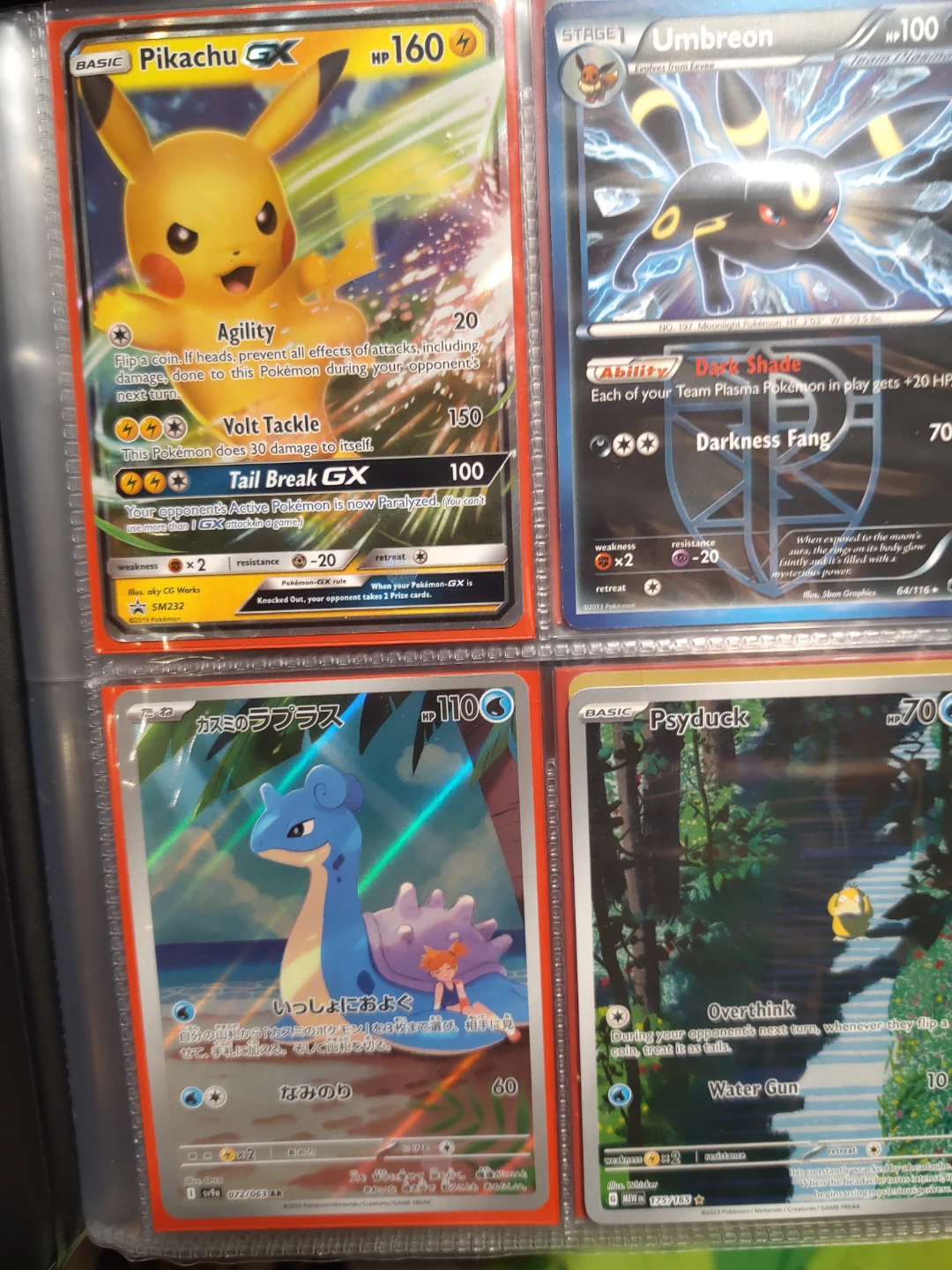 Assorted Pokemon Trading Card Collection with Album