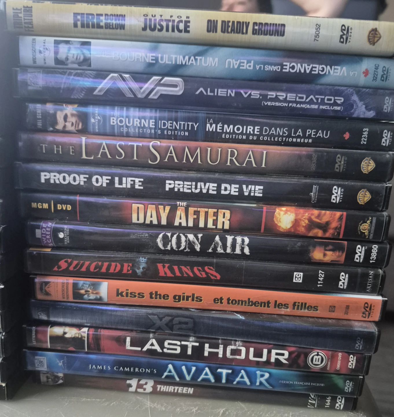 Large collection of 85 action and thriller DVDs - photo 4