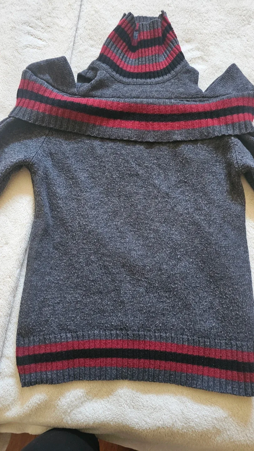 Grey turtleneck sweater with striped accents