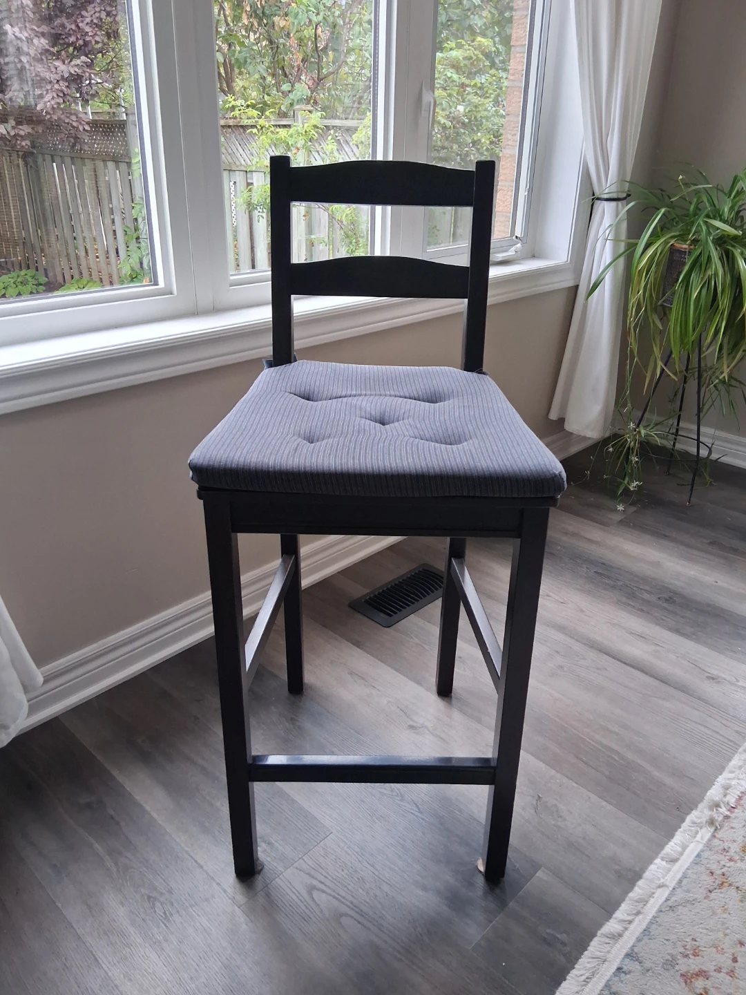 Black Ikea wooden bar stools with blue/grey cushion