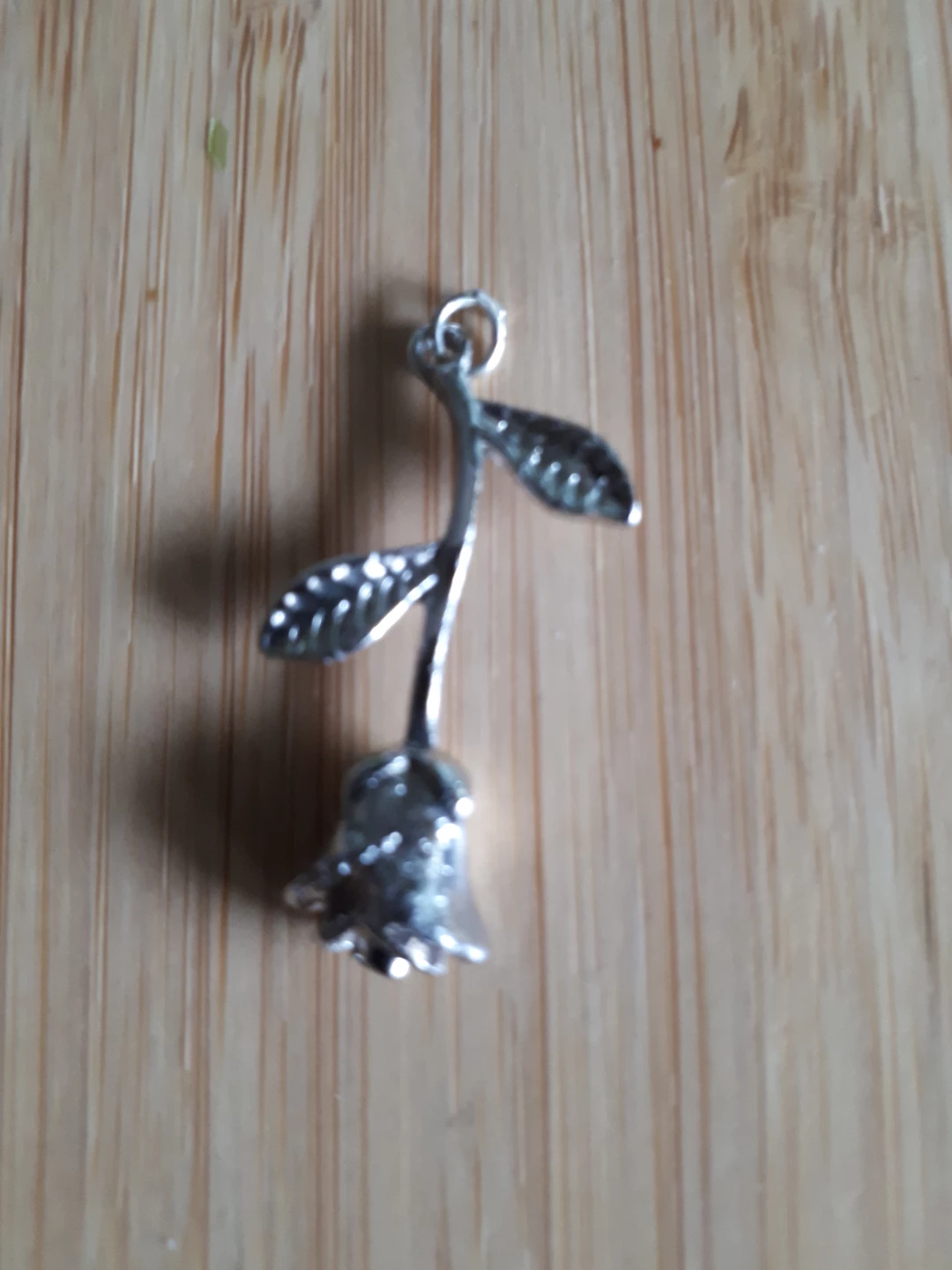 Silver-tone rose pendant