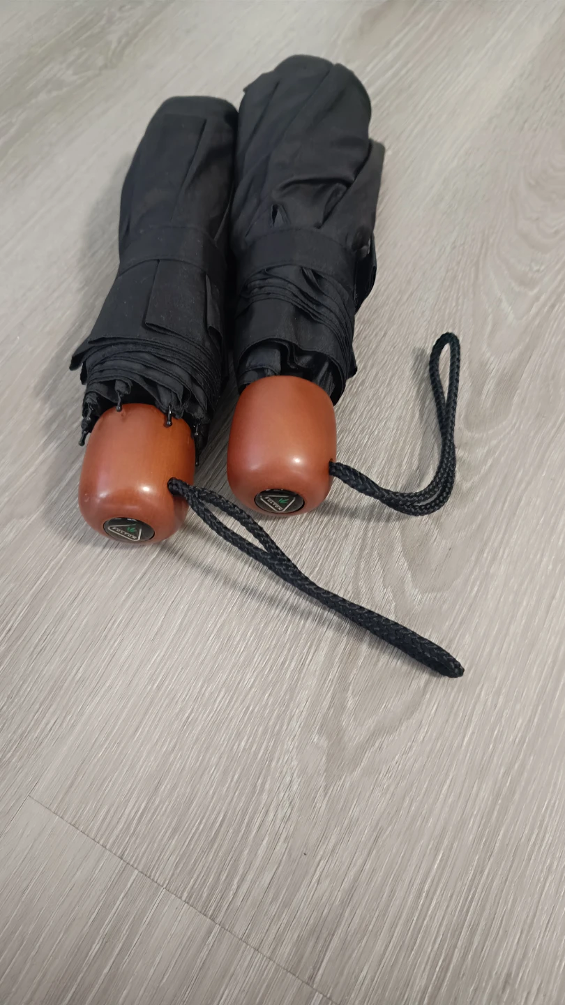 Two Fulton black umbrellas